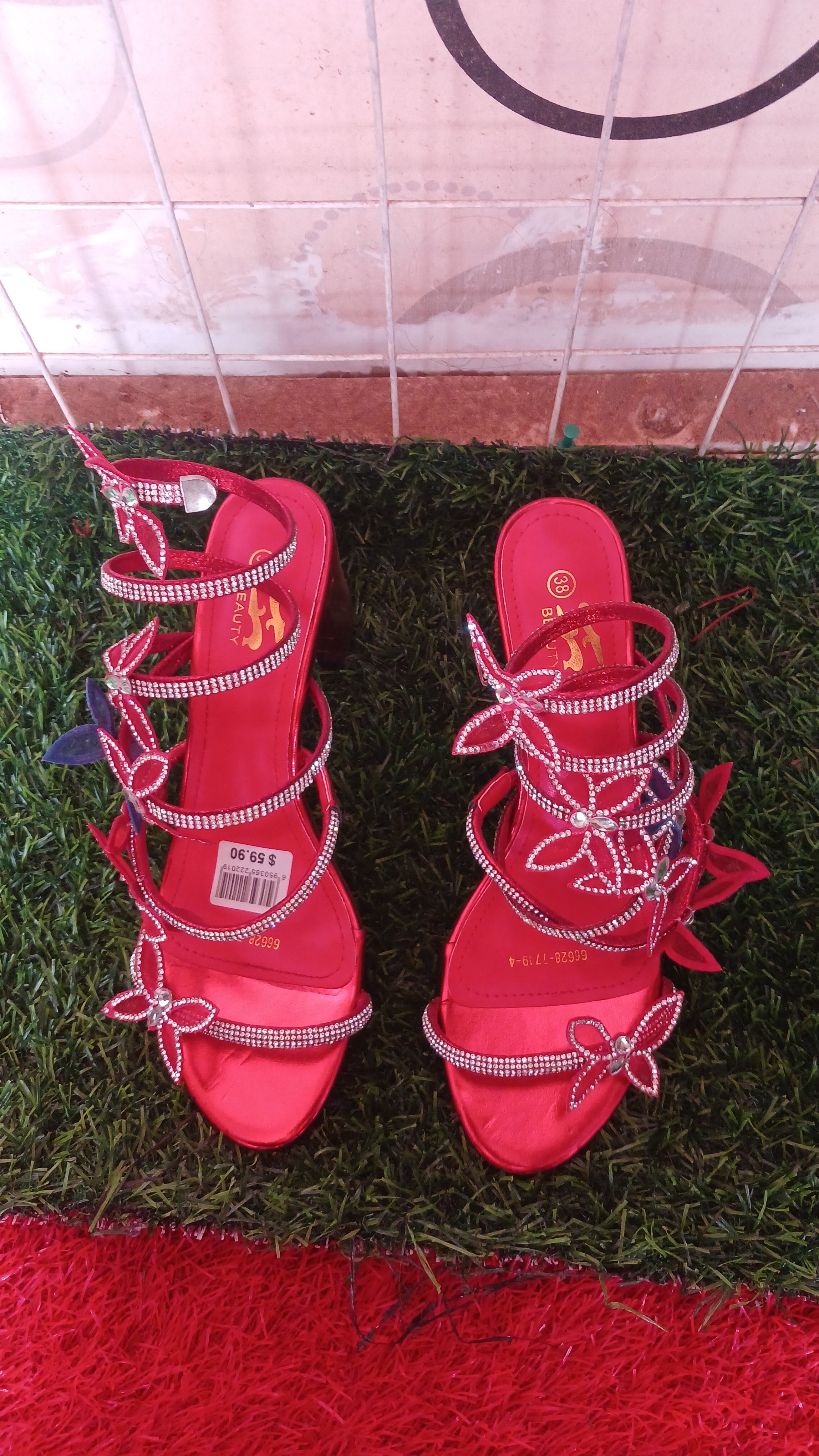 red, rhinestone-embellished butterfly strappy high heel sandals