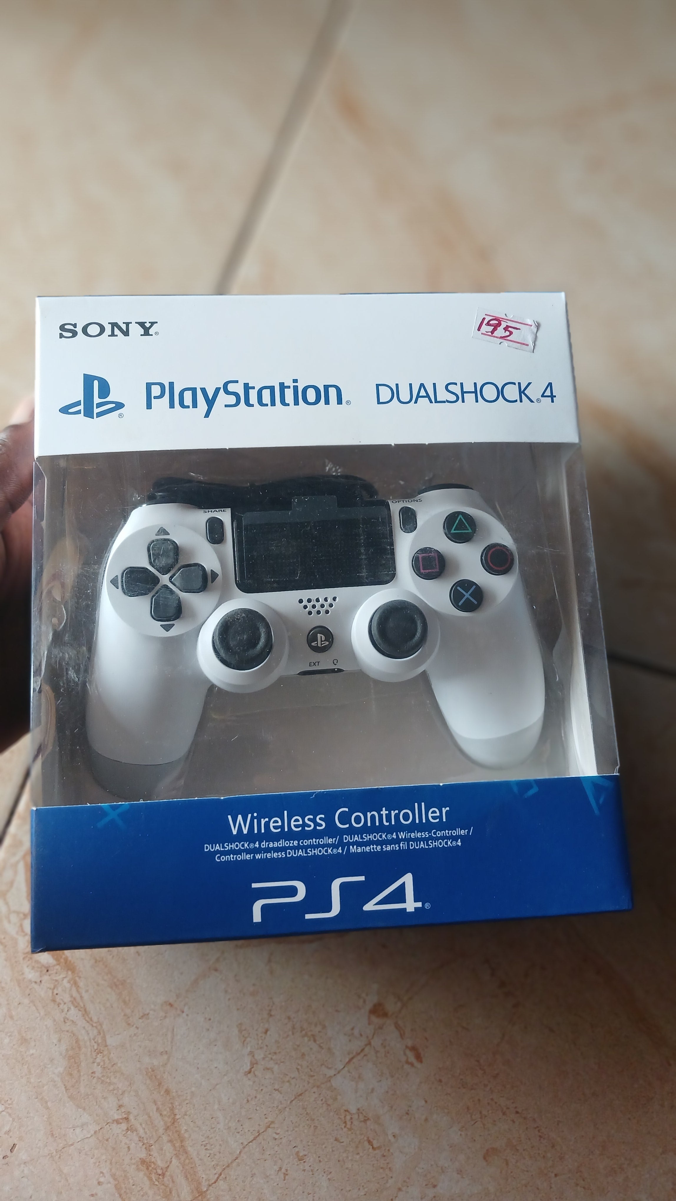 Sony DualShock 4 Wireless Controller for the PlayStation 4, specifically in the Glacier White color variant.