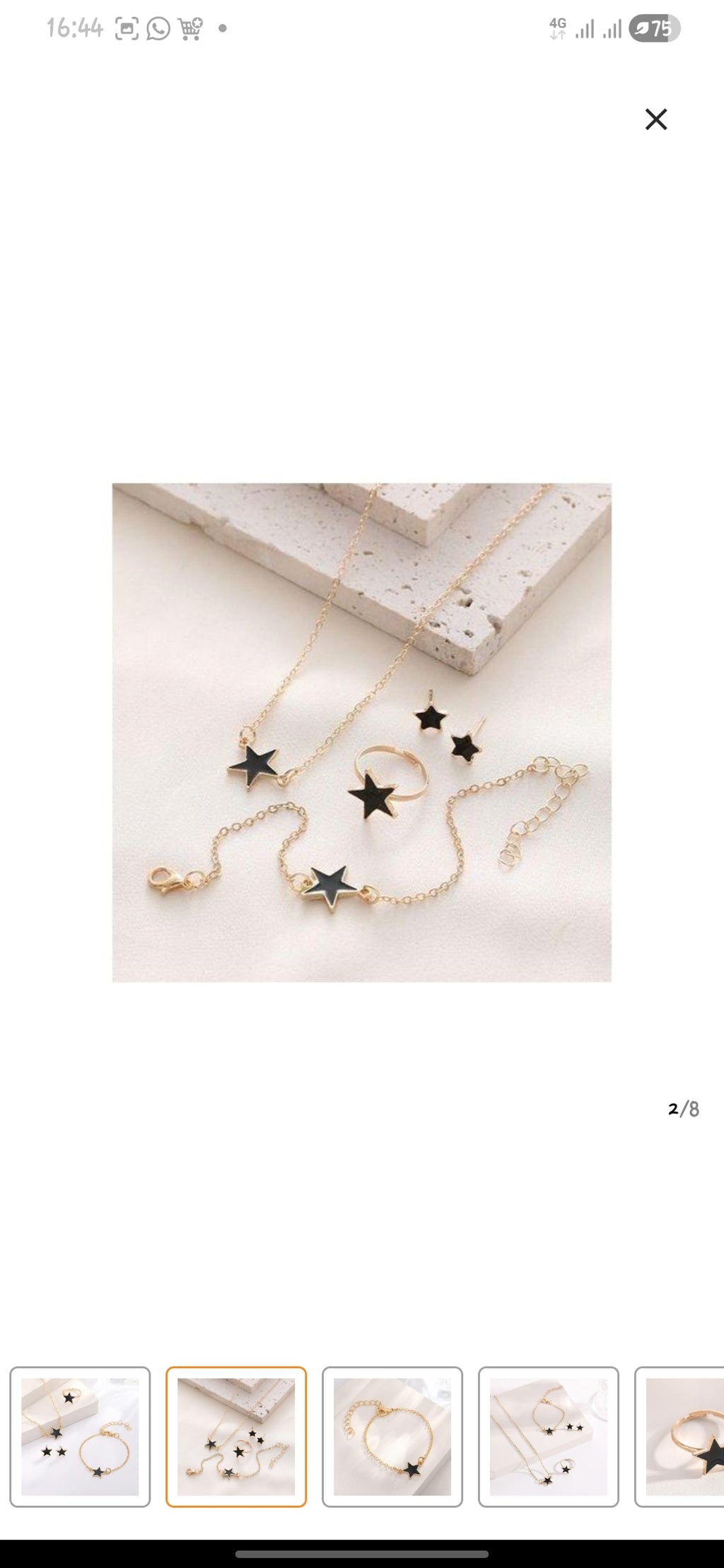 SXCHEN 4 Piece Women's Jewelry Set, which includes a necklace, bracelet, earrings, and a ring in a black and gold star design.