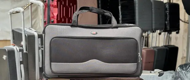 Goodpartner branded trolling traveling bag in black and gray.