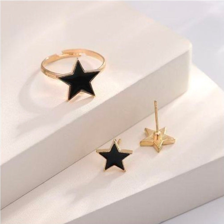 SXCHEN 4 Piece Women's Jewelry Set, which includes a necklace, bracelet, earrings, and a ring in a black and gold star design.