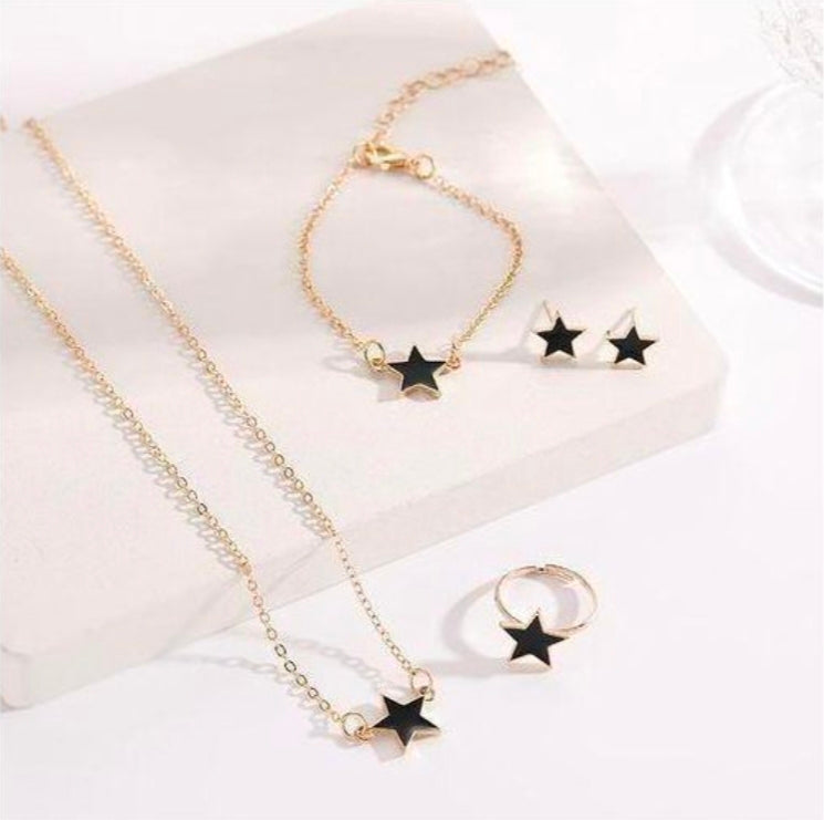 SXCHEN 4 Piece Women's Jewelry Set, which includes a necklace, bracelet, earrings, and a ring in a black and gold star design.