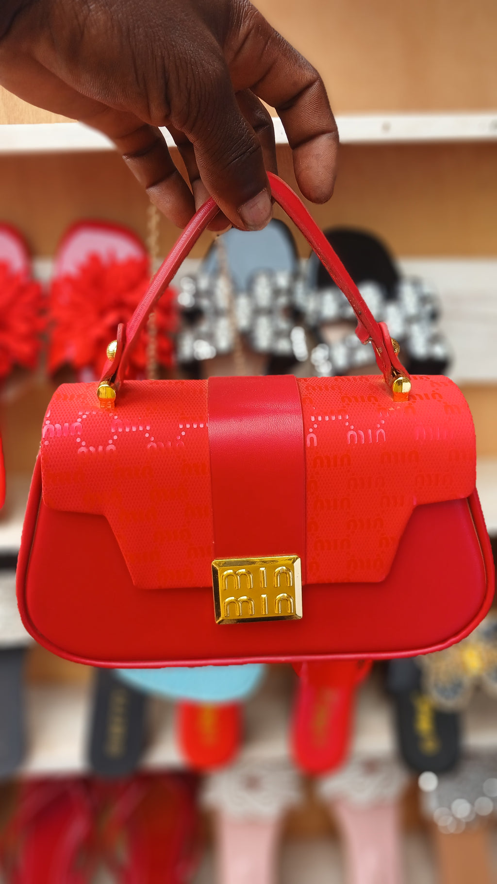 red top-handle handbag gold hardware clasp-red