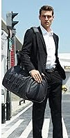 Michael Kors Bedford Travel XL weekender bag in metallic crocodile-embossed leather.