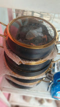 5 pieces granite-coated non-stick cookware featuring a distinctive black finish with gold accents and glass lids.