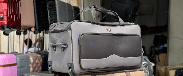 Goodpartner branded trolling traveling bag in black and gray.