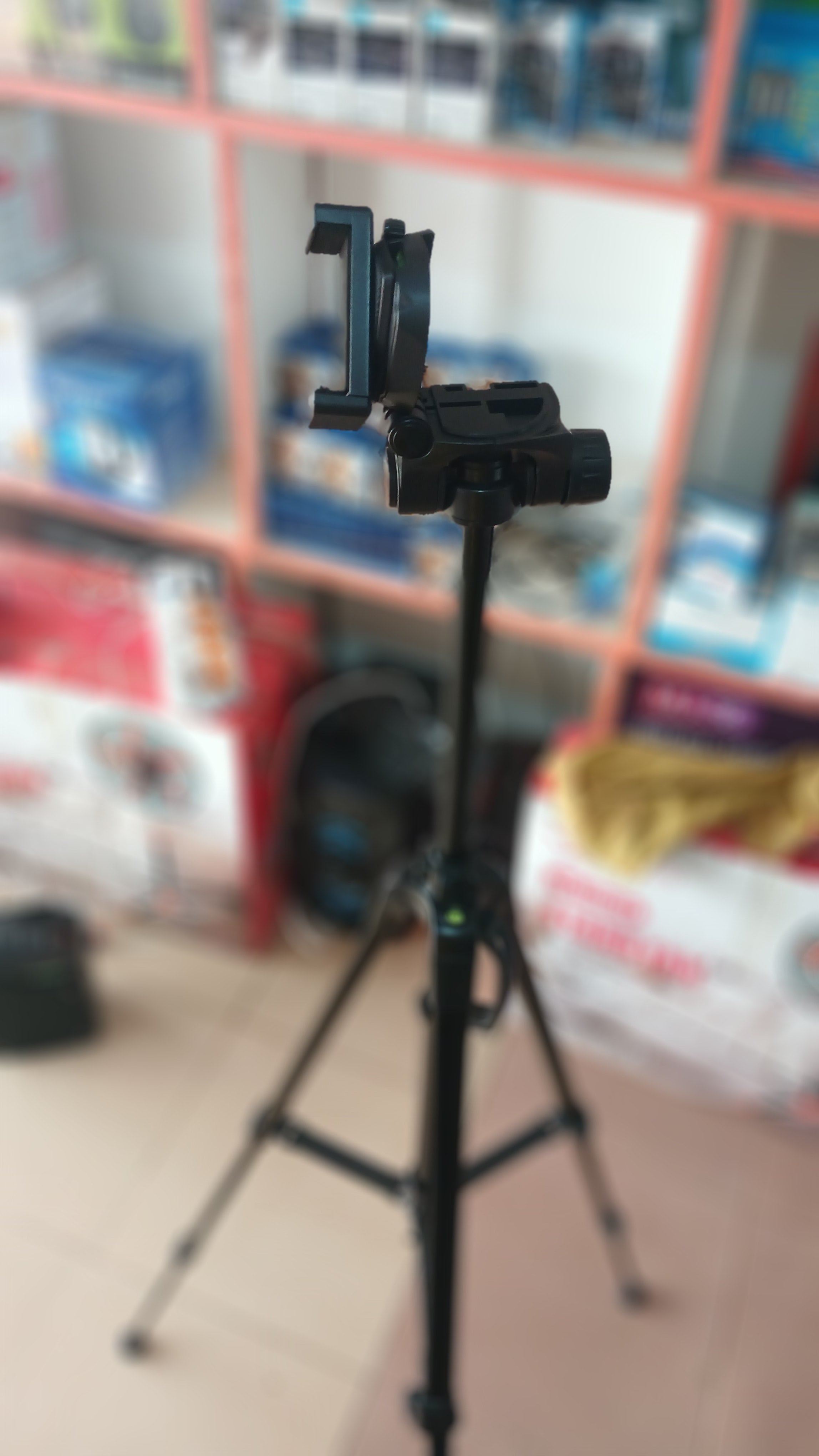 multipurpose 5ft tripod stand with a phone holder -black