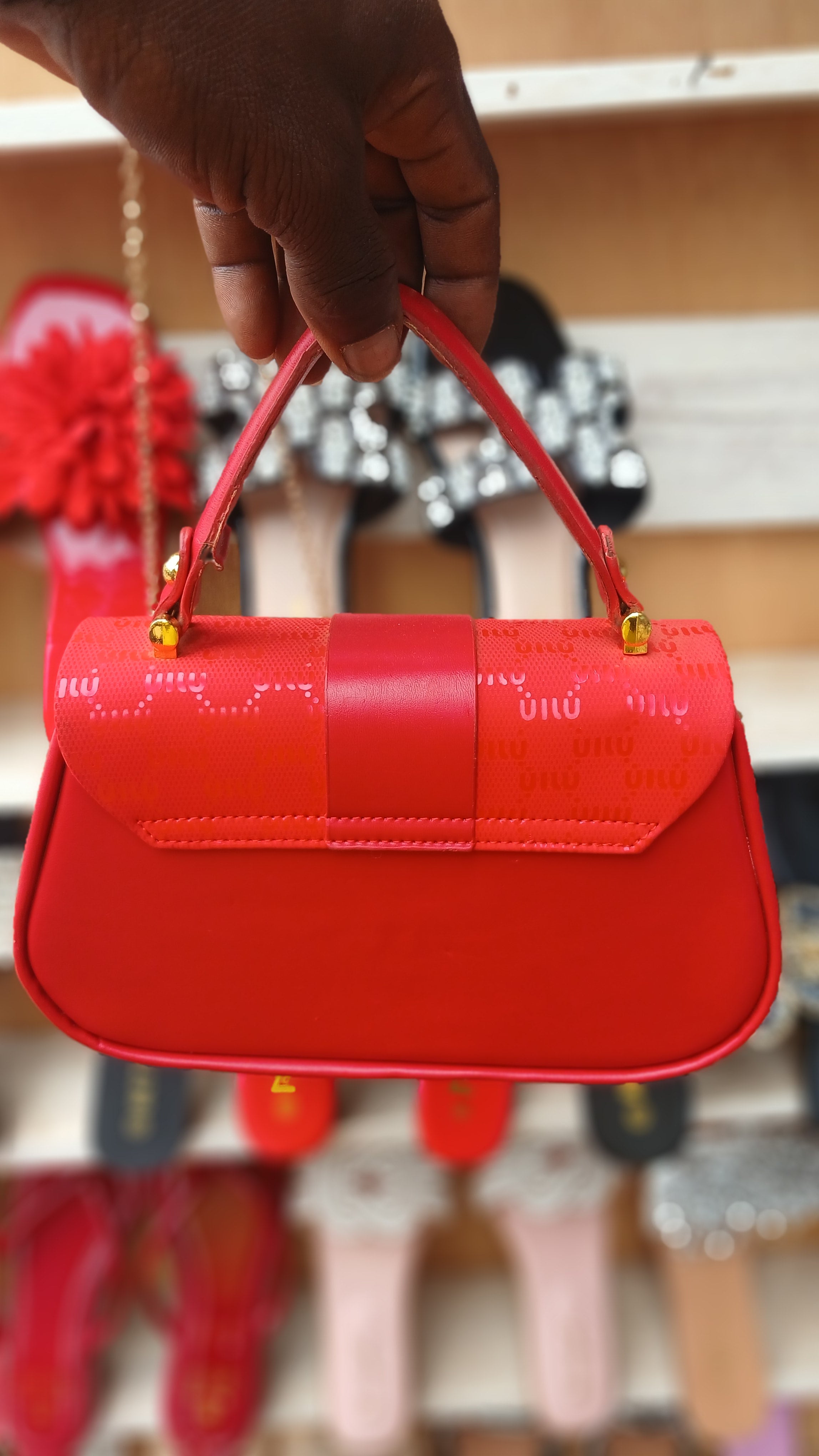 red top-handle handbag gold hardware clasp-red