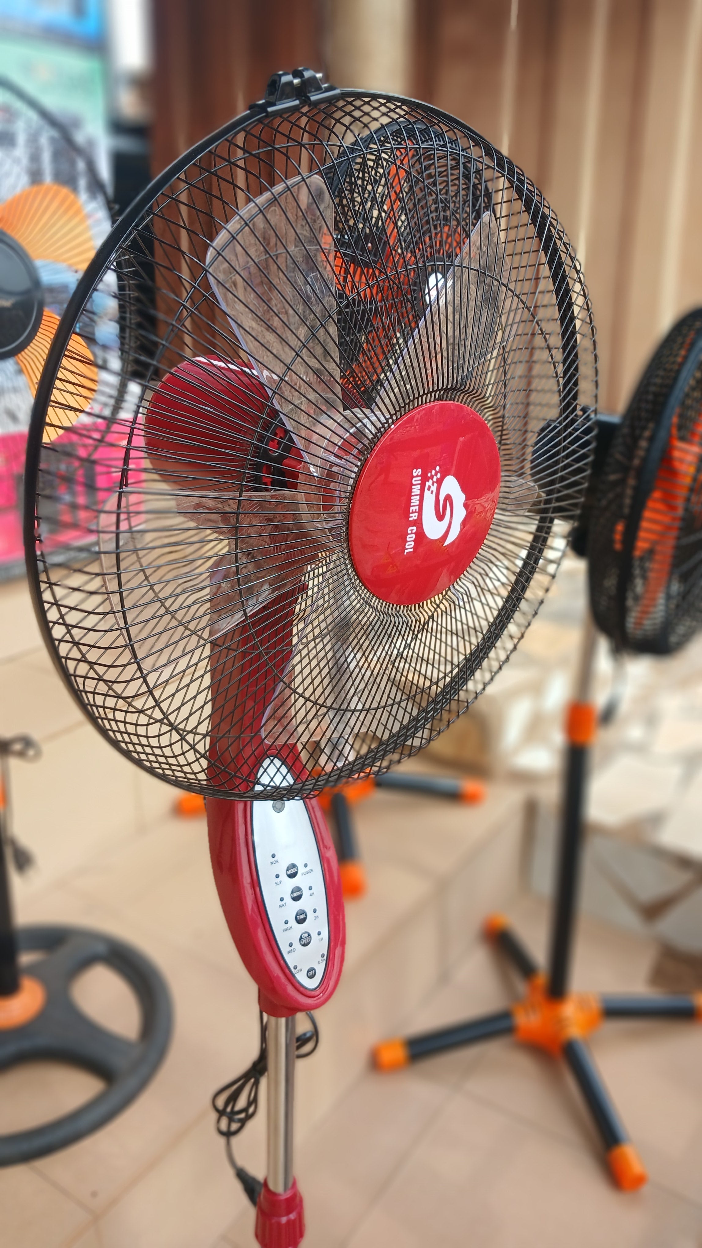 Summer Cool rechargeable pedestal fan,with remote control designed for cooling without reliance on the electrical grid