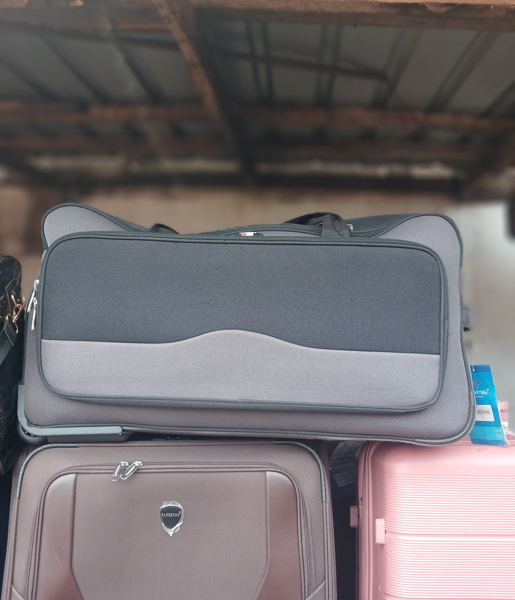 Goodpartner branded trolling traveling bag in black and gray.