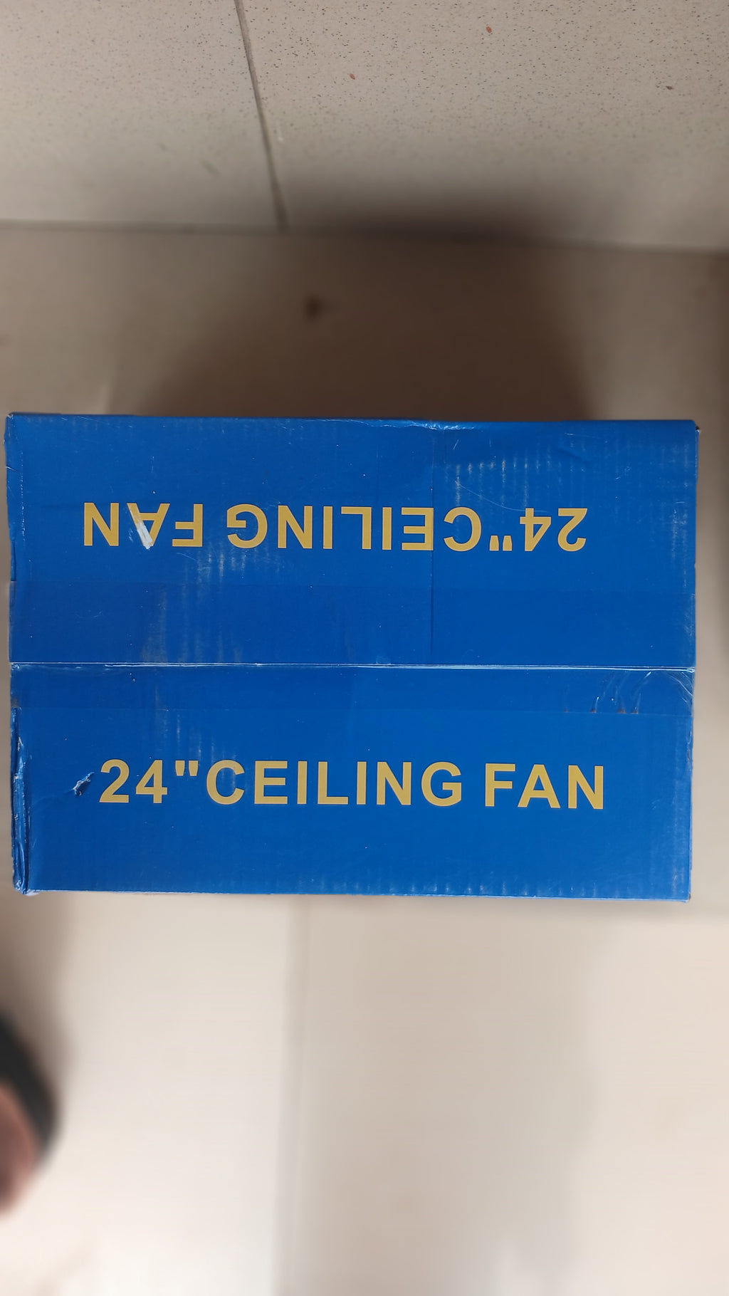 Cupack 24" Deluxe Ceiling Fan is a compact 4-blade fan designed for smaller spaces, featuring a white finish with gold accents and a sweep size of 600 mm.